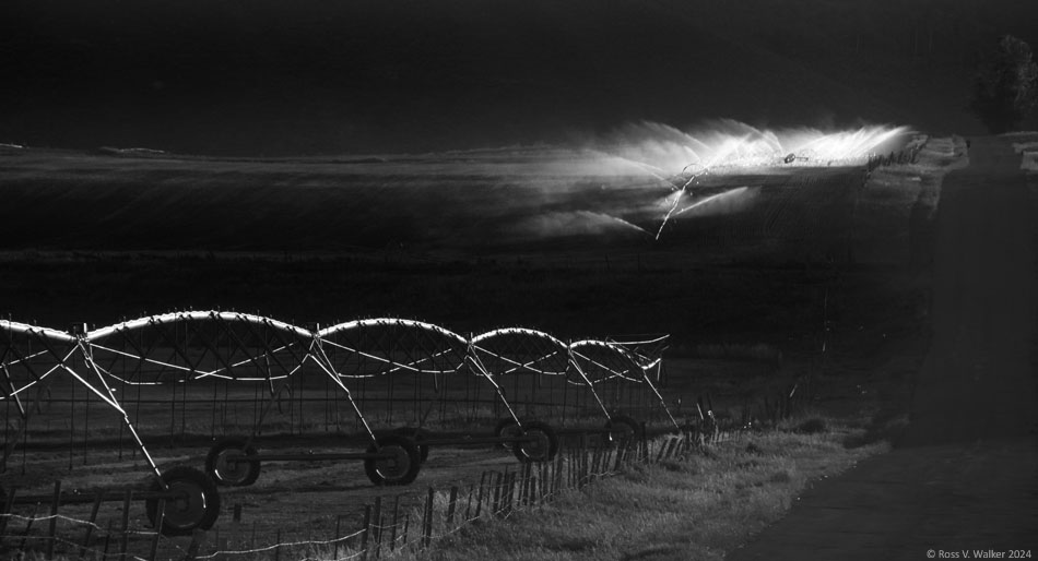 Irrigation sytems glow in late light at Georgetown, Idaho