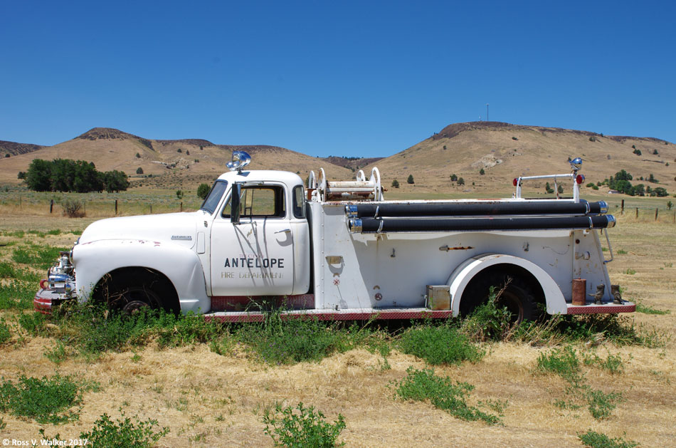 An abandoned 1948 Chevrolet fire truck sits in a field in Antelope, Oregon